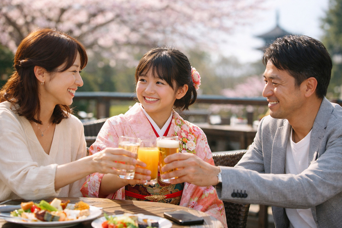 春のテラスで家族が笑顔で乾杯する十三参りの祝いのワンシーン